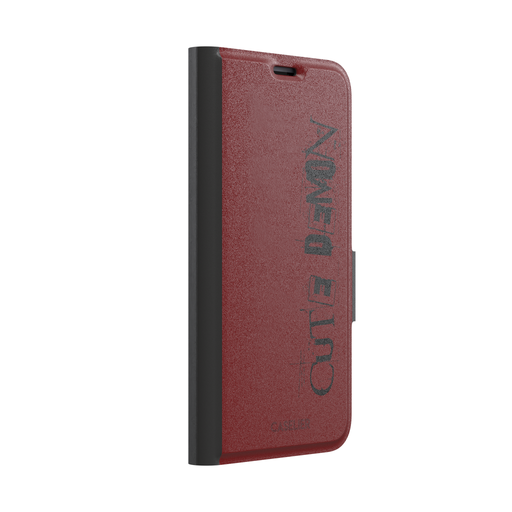 Cute Demon red phone case with vertical distressed black Cute Demon typography along the right side, phone case by Caselier — wallet case, left view