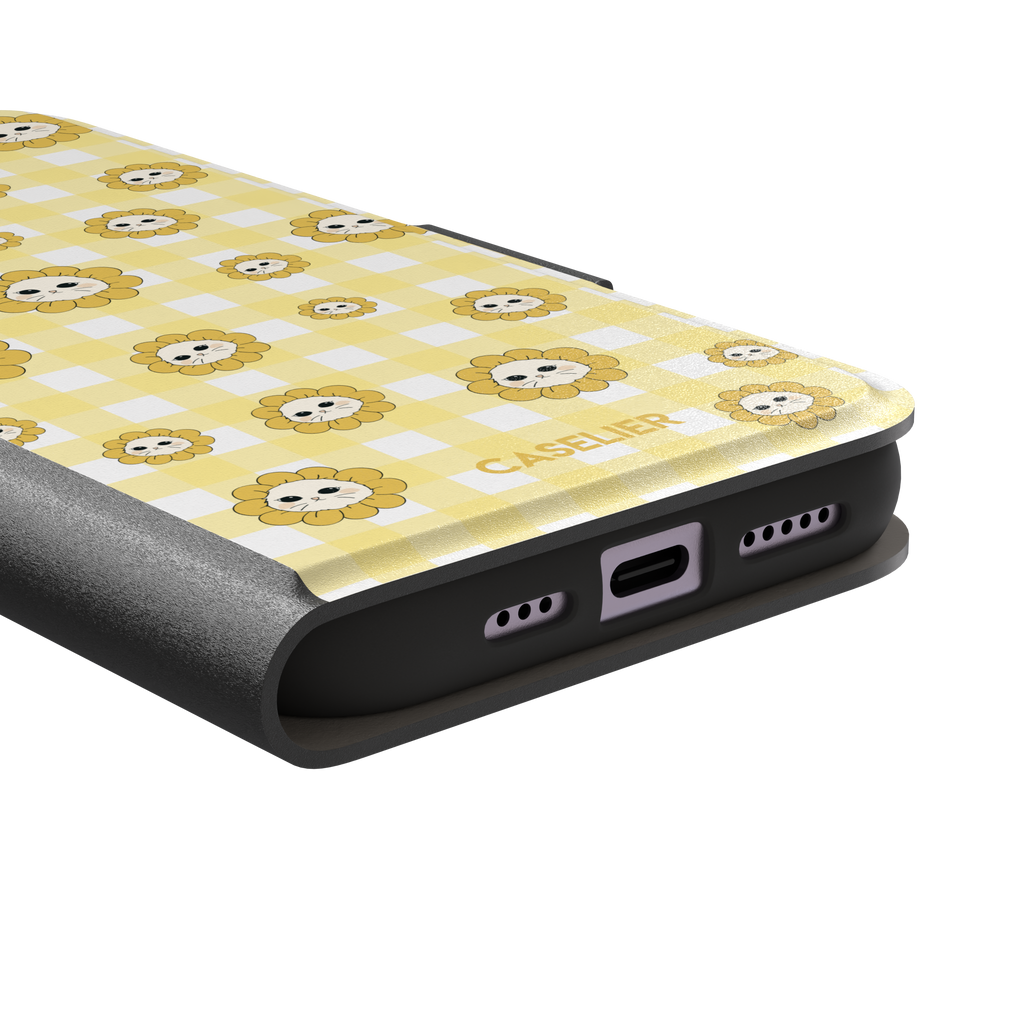 Daisies collection variant featuring cute cat-face flowers with golden petals scattered across a yellow and white gingham pattern, phone case by Caselier — wallet case, charging port detail | Caselier
