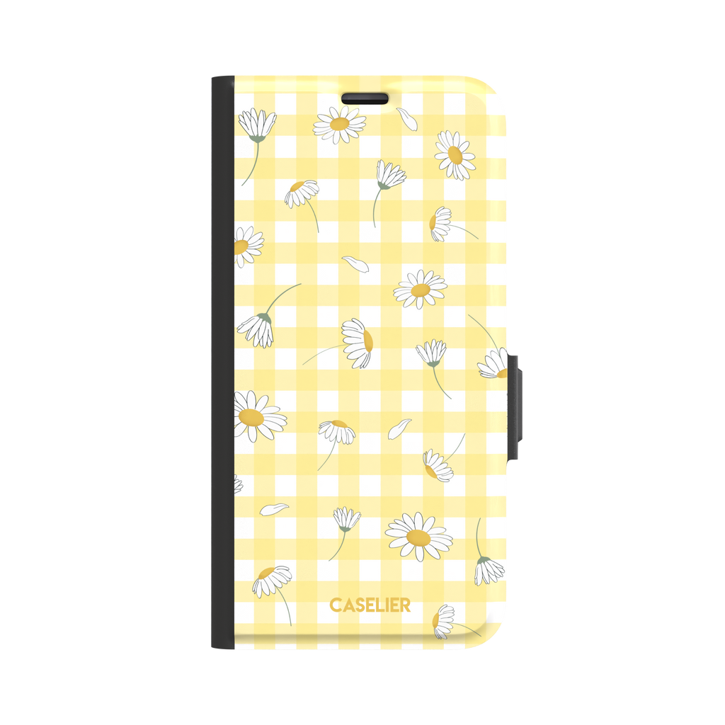 Daisies phone case with soft yellow gingham pattern and scattered white daisy illustrations with golden centres, primary product shot, phone case by Caselier — wallet case, front view | Caselier
