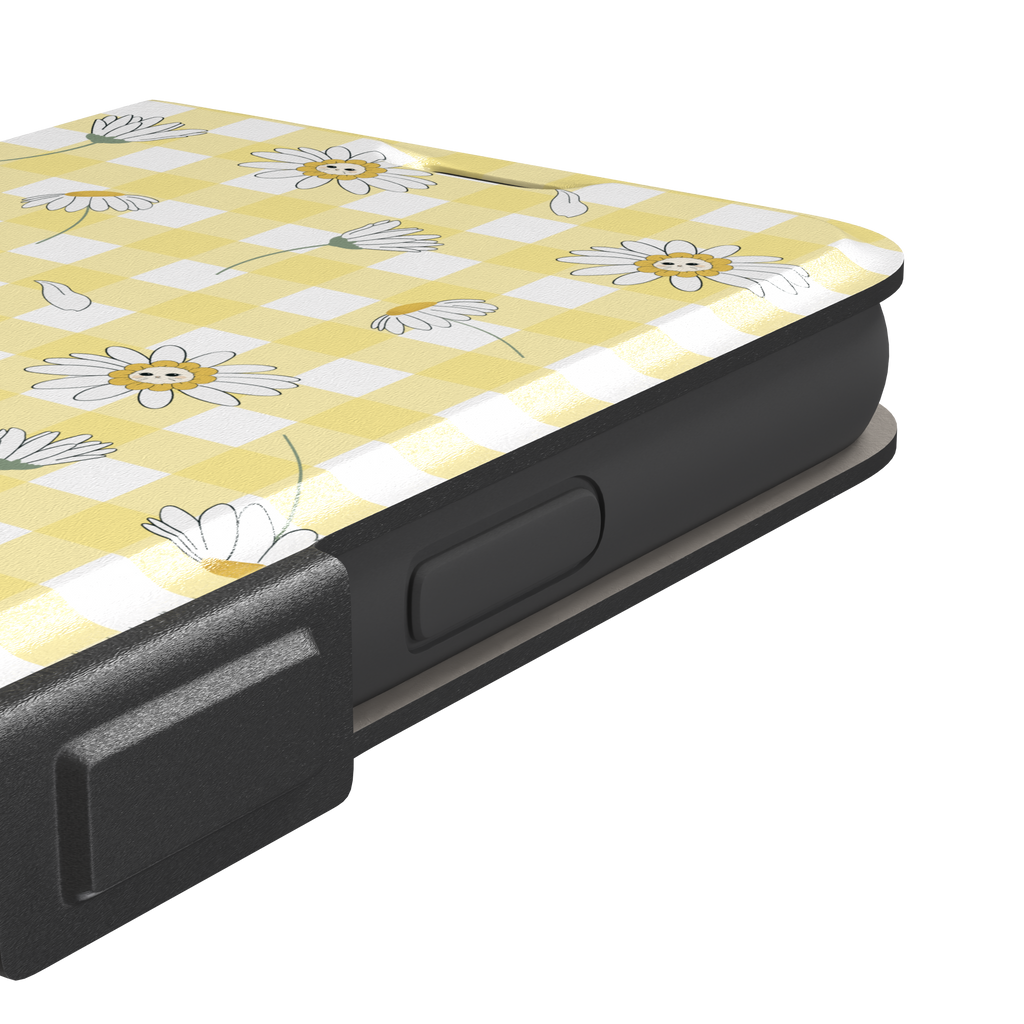Daisies phone case variant showing white daisy flowers with small smiley faces at their centres on a yellow gingham background, phone case by Caselier — wallet case, volume buttons detail | Caselier