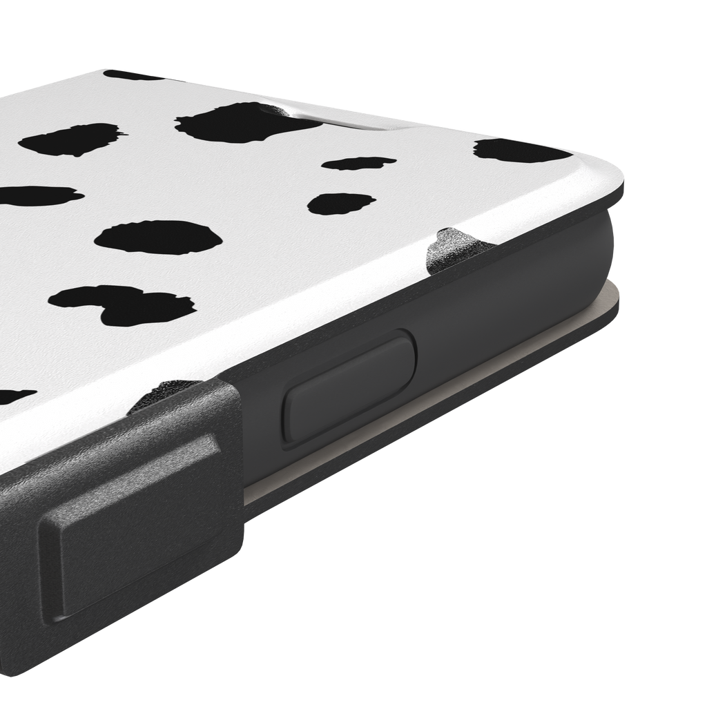 Dalmatian phone case with irregular black spots on a white background, phone case by Caselier — wallet case, volume buttons detail