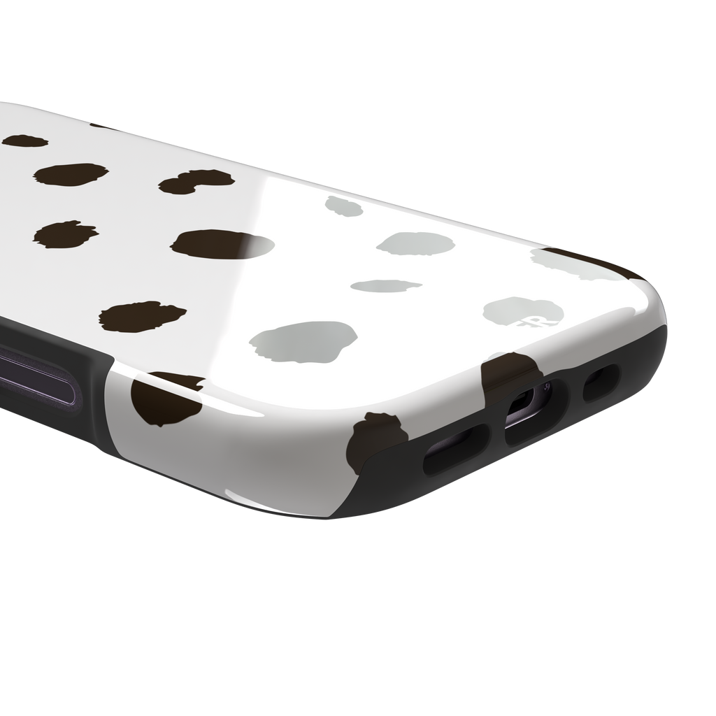 Dalmatian phone case variant with dark brown spots on a white background, phone case by Caselier — tough case, charging port detail