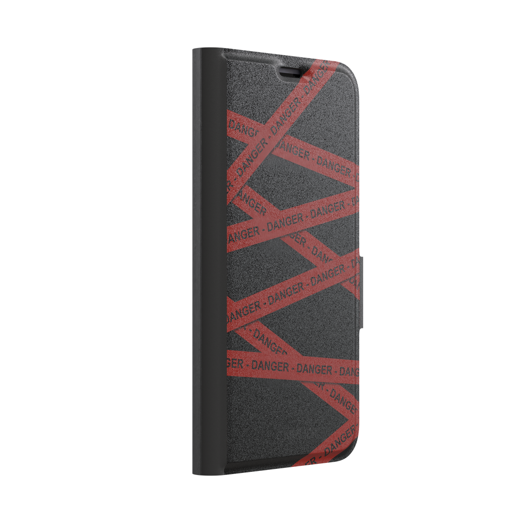 Black phone case with criss-crossing red danger tape strips printed diagonally across the back, featuring bold repeated DANGER text in black lettering — wallet case, left view