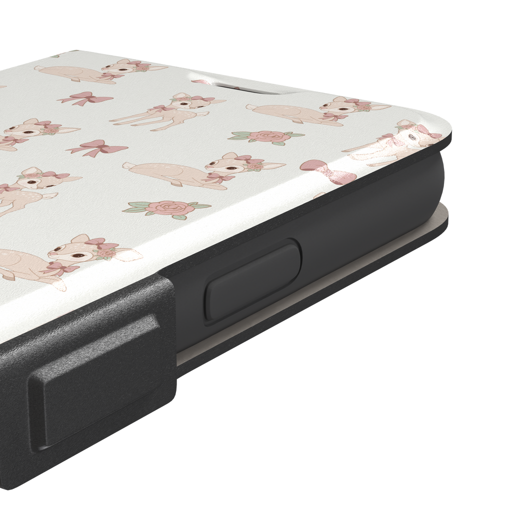 White phone case featuring a repeat pattern of illustrated fawns with pink bows and roses in a soft coquette style, phone case by Caselier — wallet case, volume buttons detail