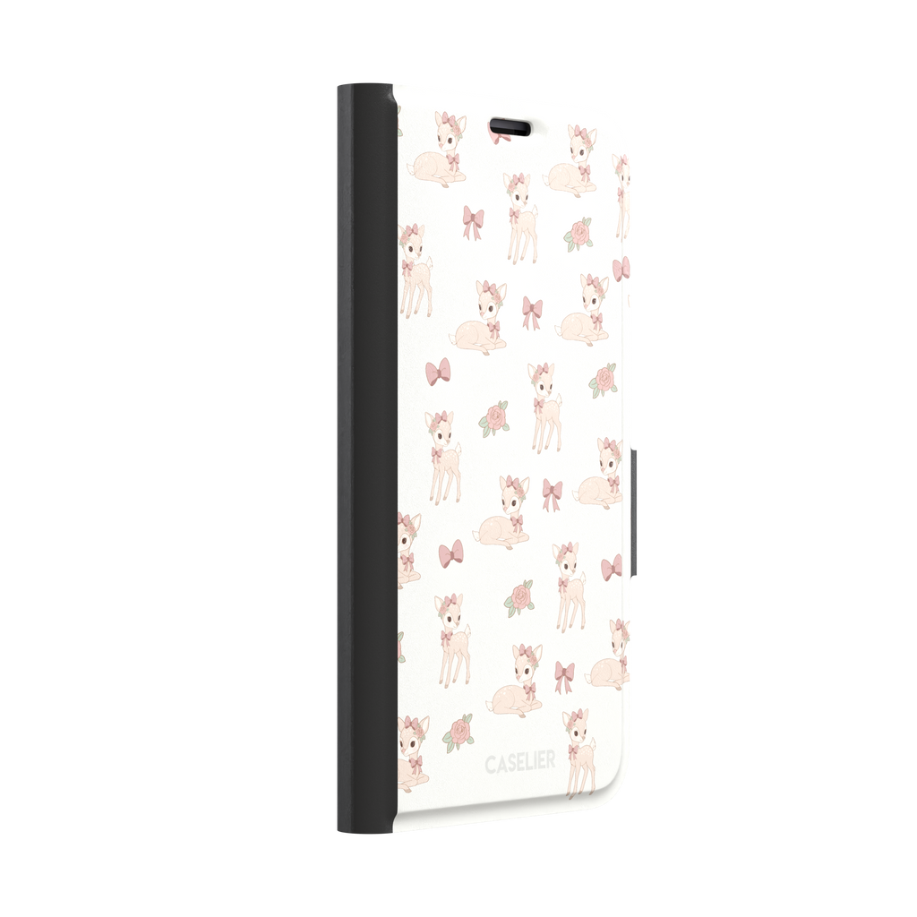 White phone case featuring a repeat pattern of illustrated fawns with pink bows and roses in a soft coquette style, phone case by Caselier — wallet case, left view
