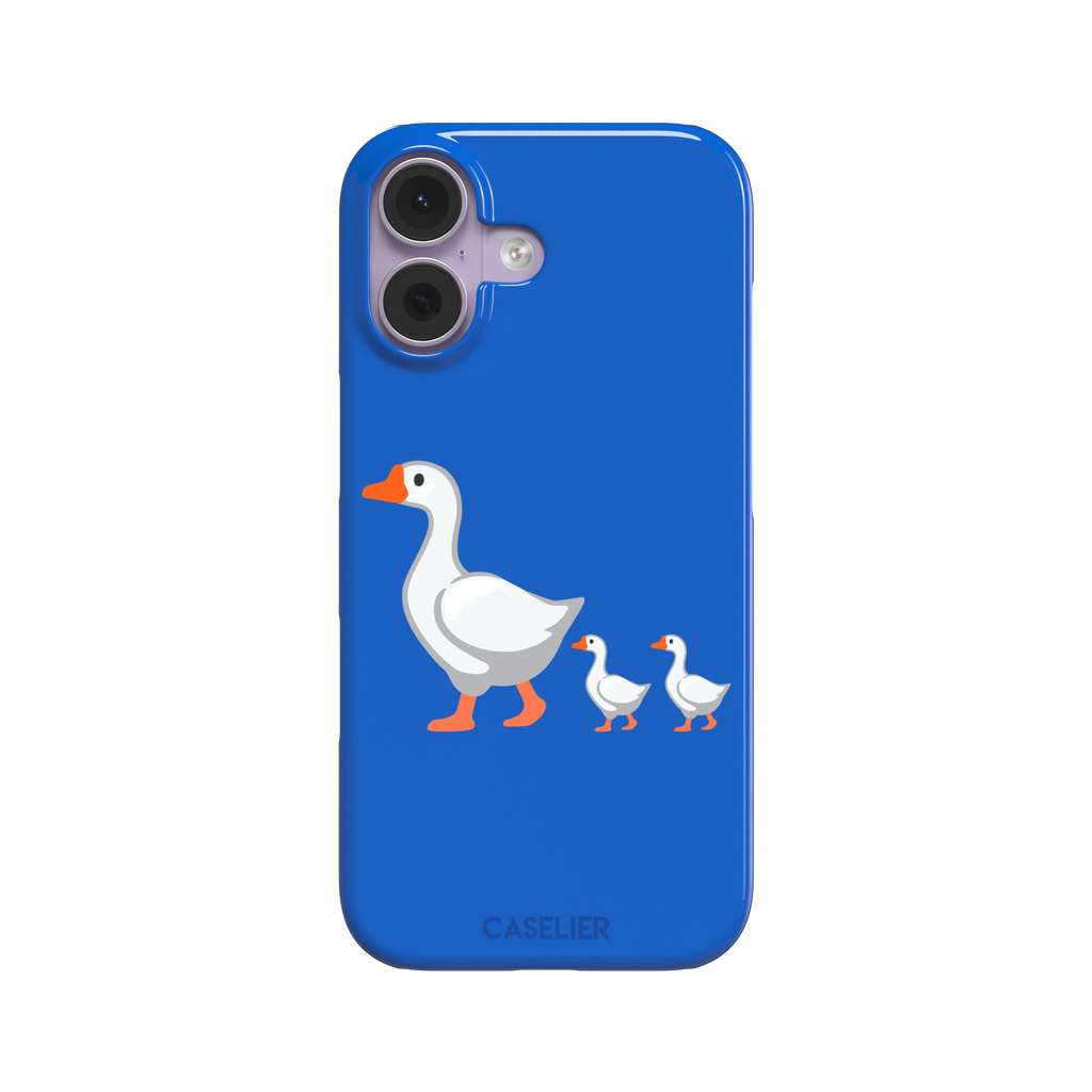 Royal blue phone case with a cartoon mother goose and two goslings walking in a line, emoji-style illustration with white birds and orange beaks and feet, phone case by Caselier — snap case, front view
