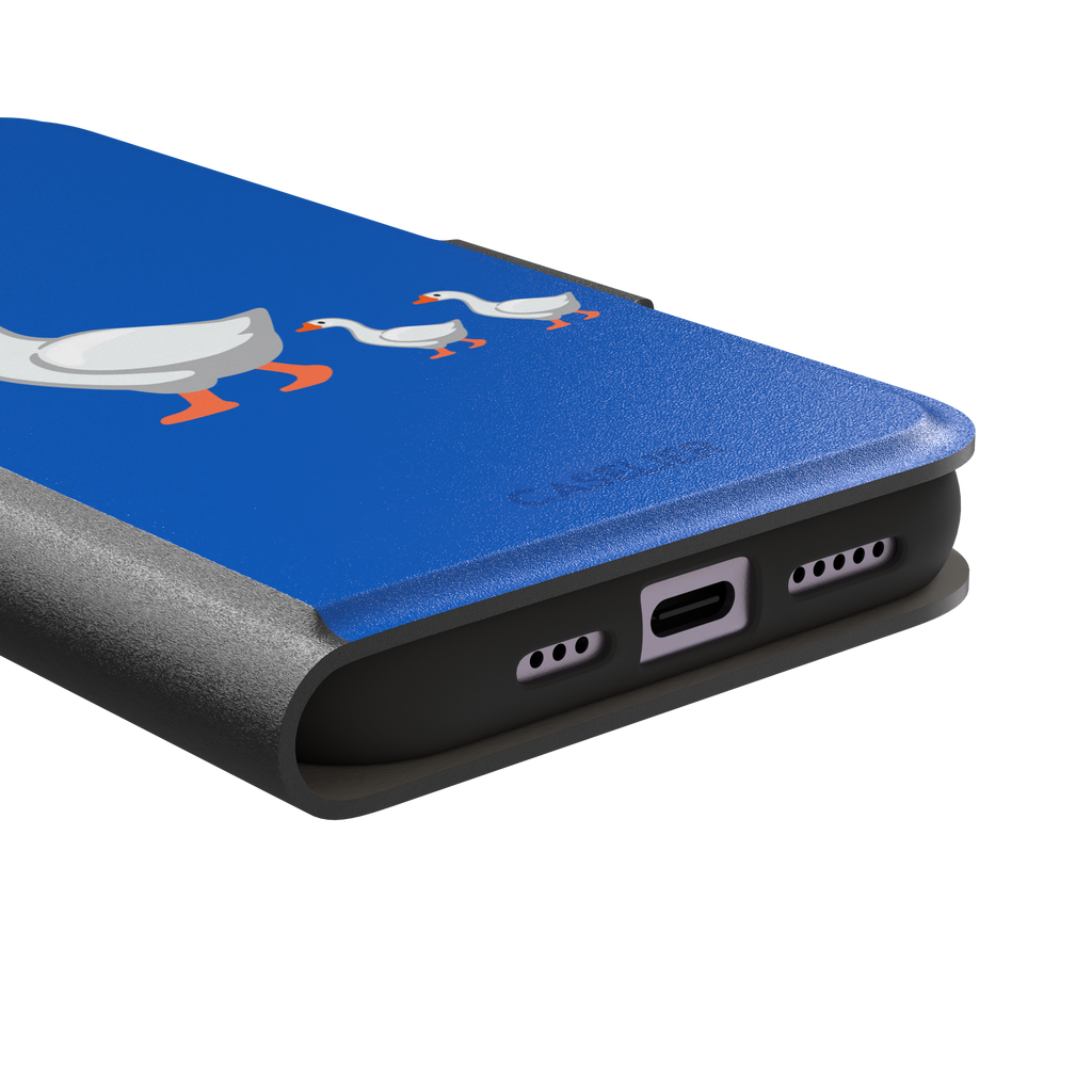 Royal blue phone case with a cartoon mother goose and two goslings walking in a line, emoji-style illustration with white birds and orange beaks and feet, phone case by Caselier — wallet case, charging port detail