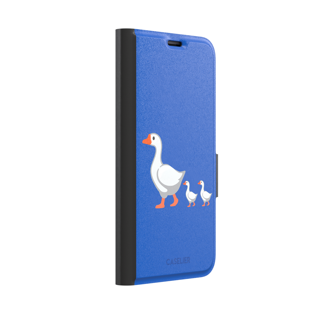 Royal blue phone case with a cartoon mother goose and two goslings walking in a line, emoji-style illustration with white birds and orange beaks and feet, phone case by Caselier — wallet case, left view