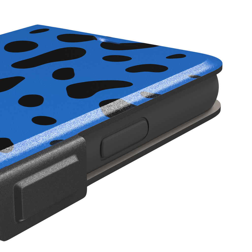 Frog phone case in cobalt blue with scattered irregular black spots in an animal print pattern, phone case by Caselier — wallet case, volume buttons detail