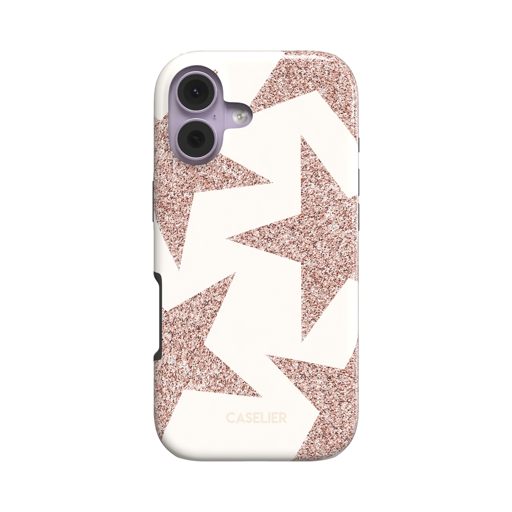 Slightly angled front view of a snap phone case with oversized rose gold glitter stars on a cream background, showing the slim profile and side buttons, white background, phone case by Caselier - tough case, front view | Caselier