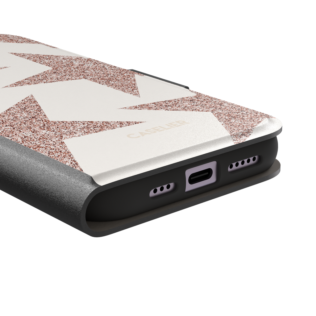 Glitter Star, overlapping glitter stars in rose gold on cream, wallet case, charging port detail, phone case by Caselier