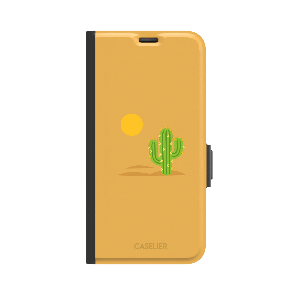 Gobi Desert phone case in warm amber with a minimalist green cactus and golden sun illustration, phone case by Caselier — wallet case, front view