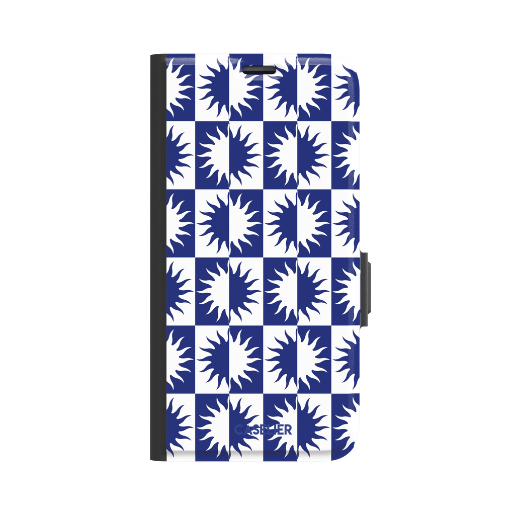 Half-Sun phone case in navy blue and white checkerboard pattern with repeating jagged sun motifs, phone case by Caselier — wallet case, front view