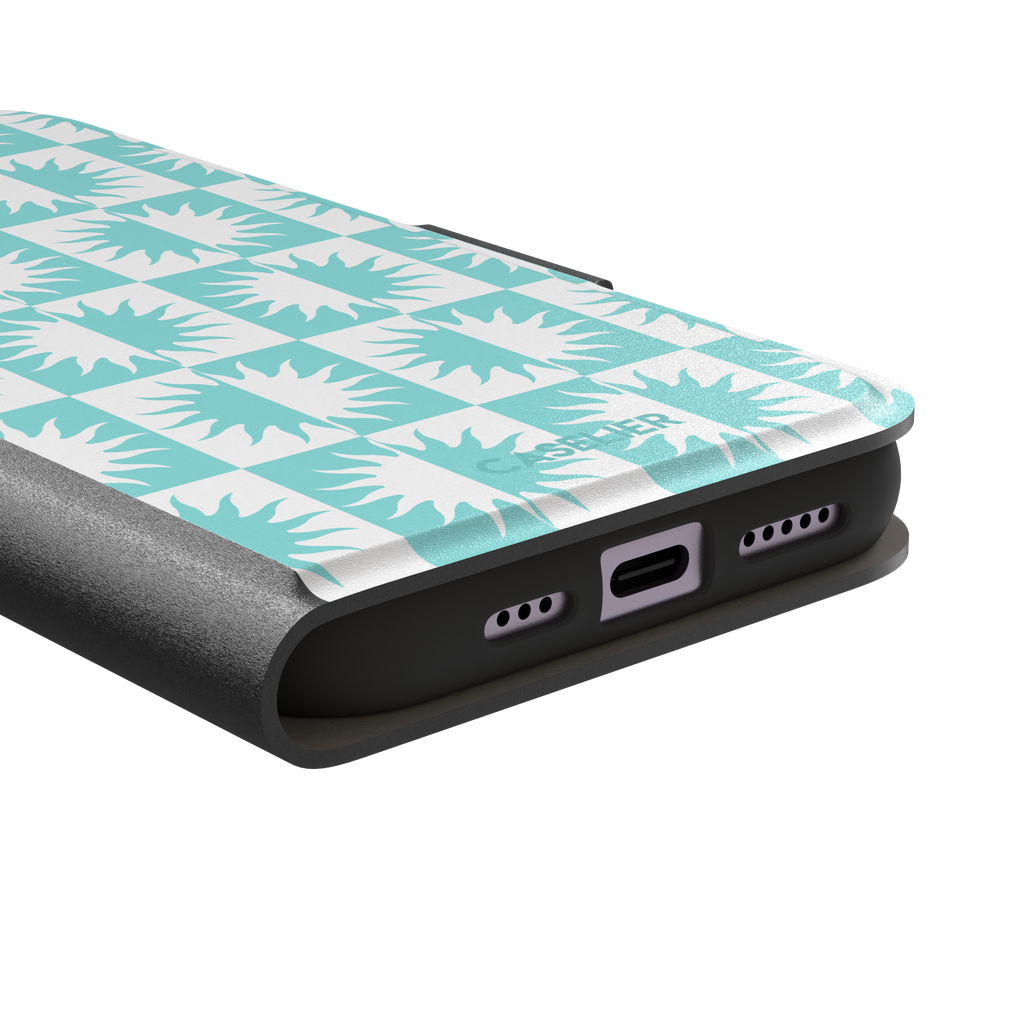 Half-Sun phone case in mint turquoise and white checkerboard pattern with repeating jagged sun motifs, phone case by Caselier — wallet case, charging port detail