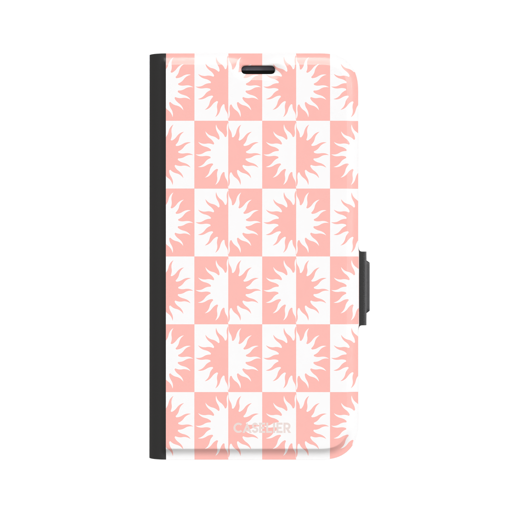 Half-Sun phone case in blush pink and white checkerboard pattern with repeating jagged sun motifs, phone case by Caselier — wallet case, front view