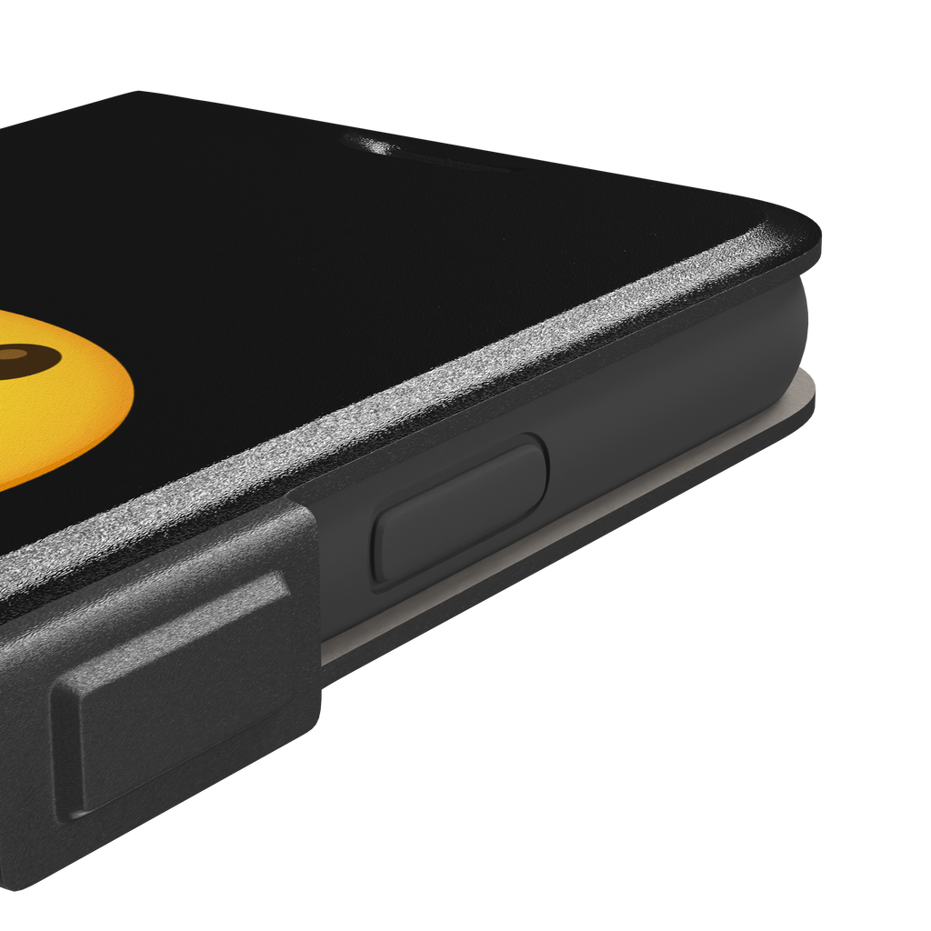 Hungry phone case featuring a bold yellow wide-mouthed screaming emoji on a matte black background, phone case by Caselier — wallet case, volume buttons detail