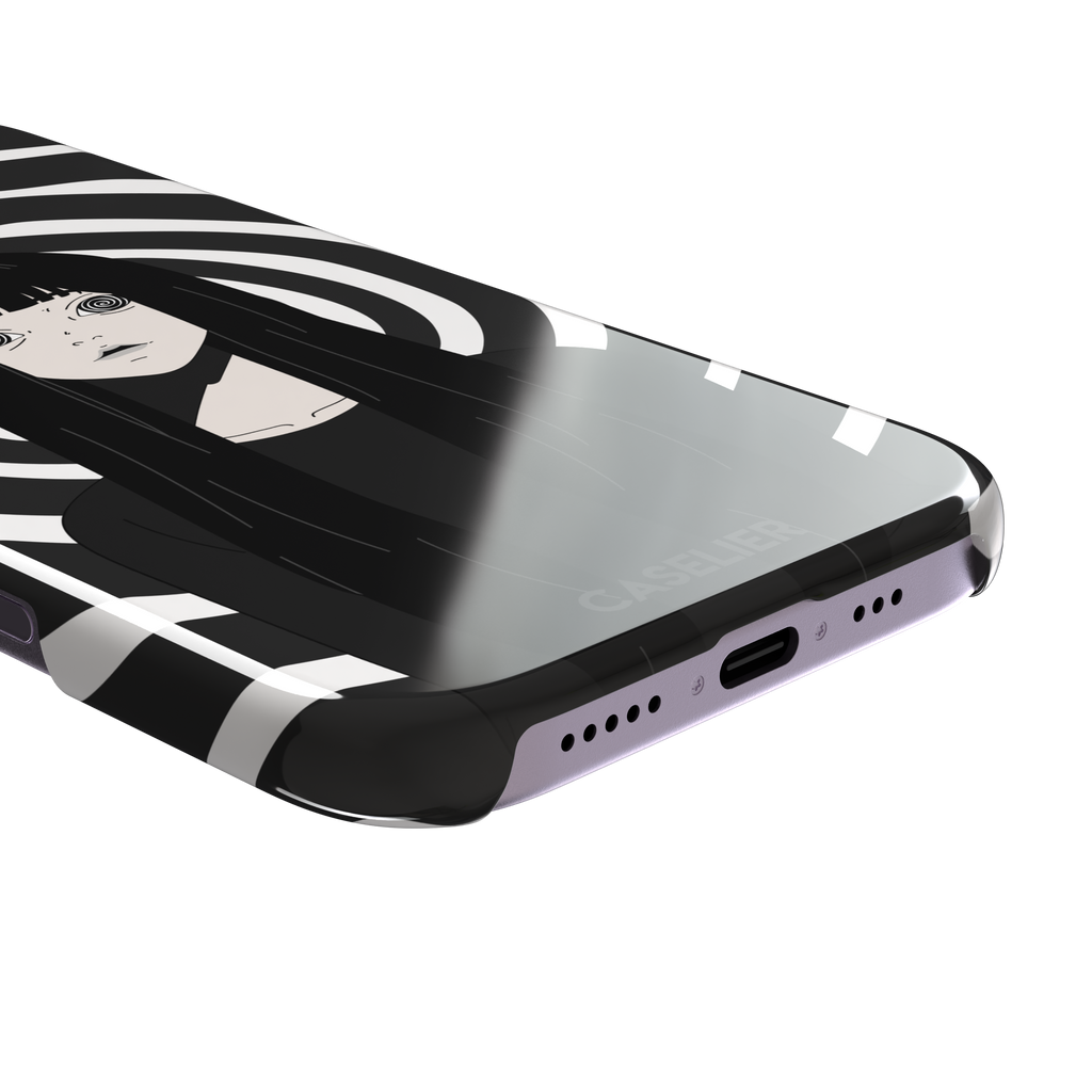 Hypnotized phone case in high-contrast black and white variant, showing the same anime girl with spiral eyes against bold graphic concentric rings, phone case by Caselier — snap case, charging port detail