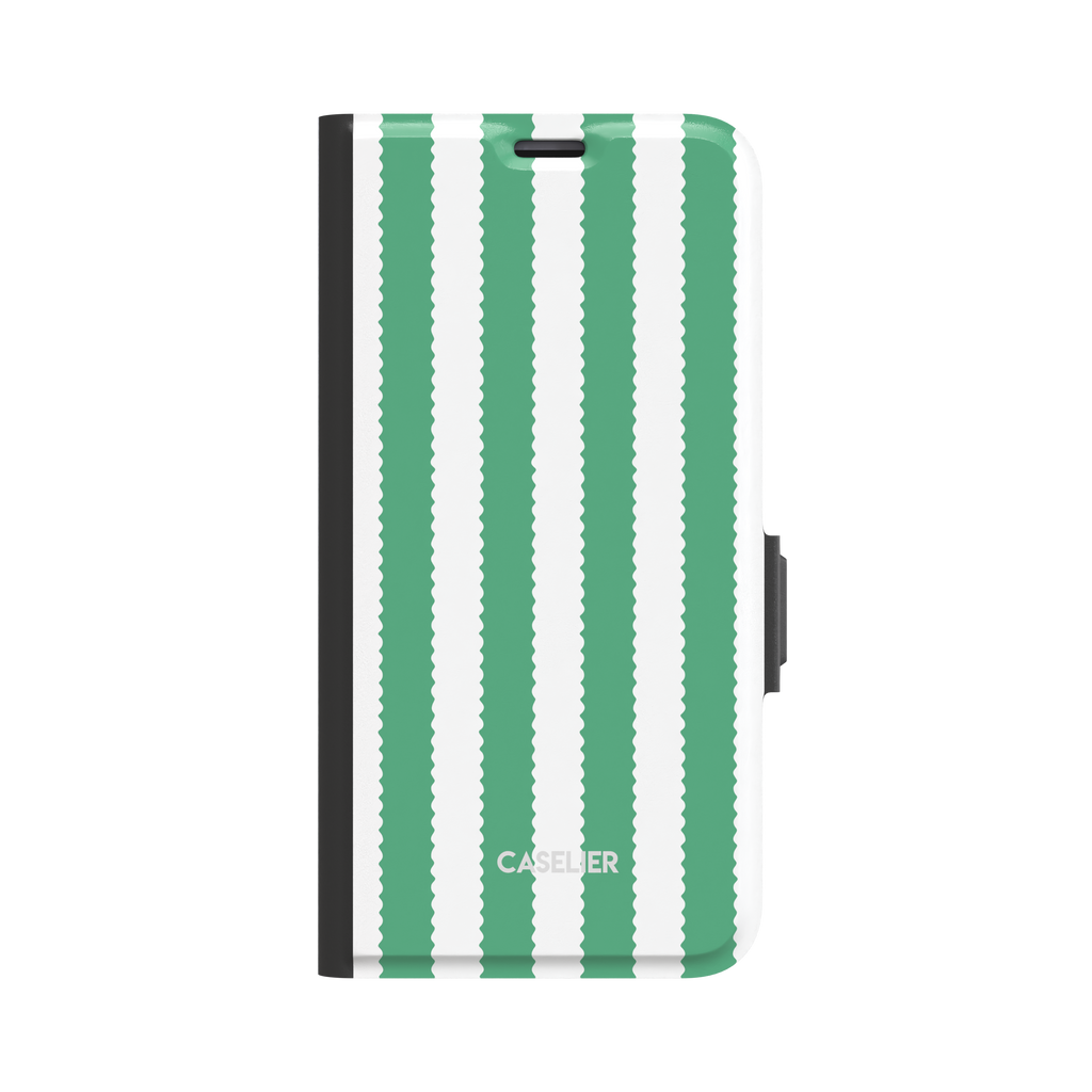Jagged Stripes folio wallet case in green and white, broad vertical stripes with wavy zigzag edges, closed folio style with black spine and side clasp, front-facing view on white background, phone case by Caselier - wallet case, front view | Caselier
