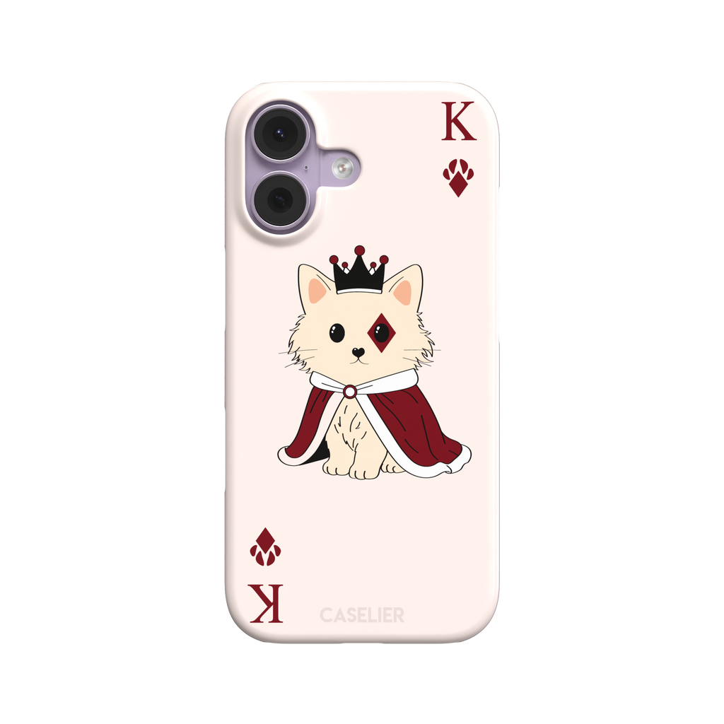 King of Diamonds phone case in blush pink from the Paw Decks collection, featuring a crowned fluffy dog in a deep red royal cape styled as a playing card, phone case by Caselier — snap case, front view