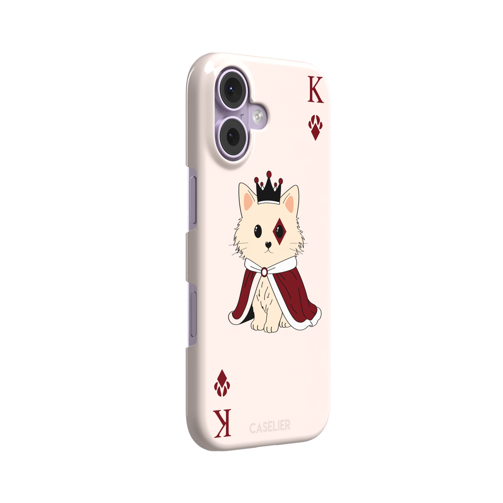 King of Diamonds phone case in blush pink from the Paw Decks collection, featuring a crowned fluffy dog in a deep red royal cape styled as a playing card, phone case by Caselier — snap case, left view