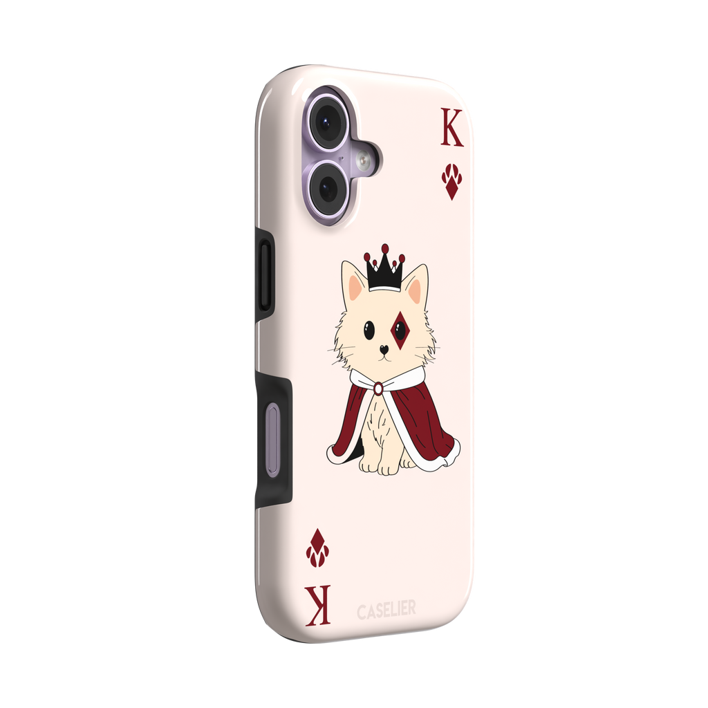 King of Diamonds phone case in blush pink from the Paw Decks collection, featuring a crowned fluffy dog in a deep red royal cape styled as a playing card, phone case by Caselier — tough case, left view