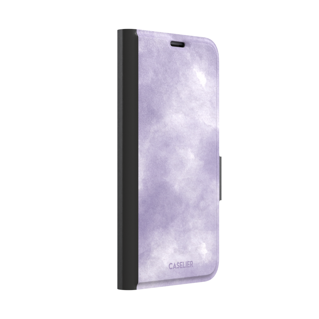 Lavender soft purple watercolor phone case with dreamy white cloud-like blends on an iPhone, phone case by Caselier — wallet case, left view