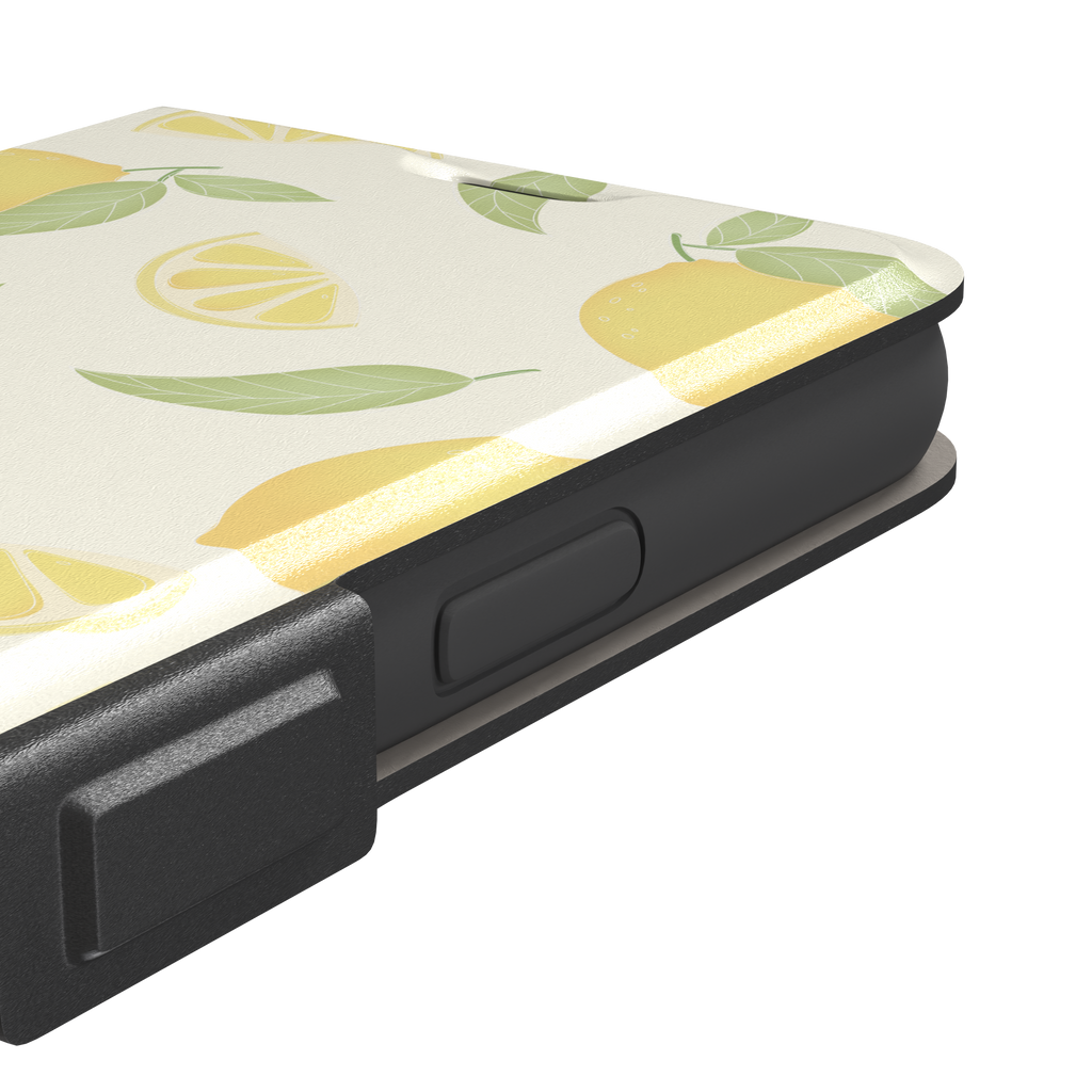 Lemons phone case with a cream background featuring golden whole lemons, lemon slices, and sage green leaves in a repeat pattern, phone case by Caselier — wallet case, volume buttons detail