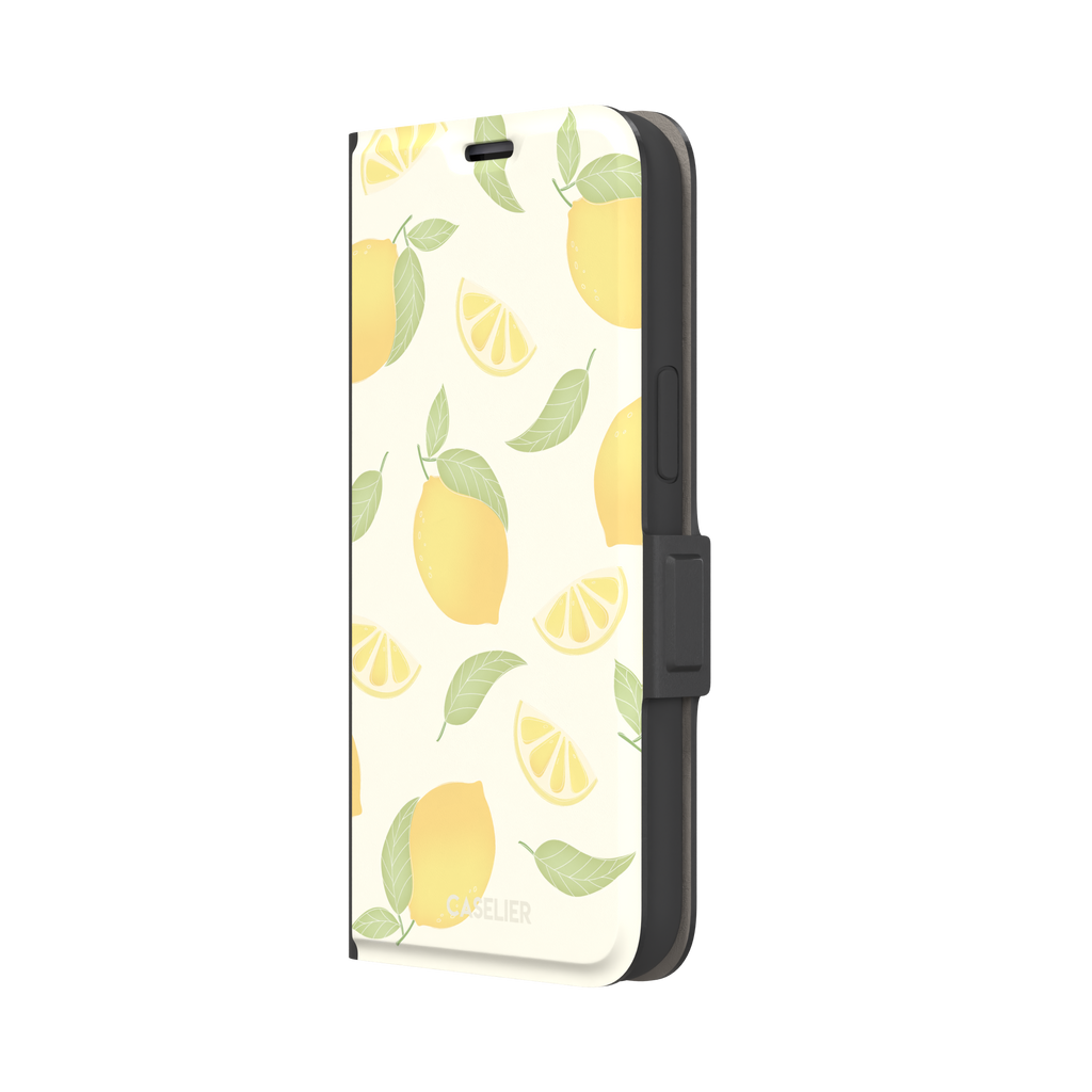 Lemons phone case with a cream background featuring golden whole lemons, lemon slices, and sage green leaves in a repeat pattern, phone case by Caselier — wallet case, right view