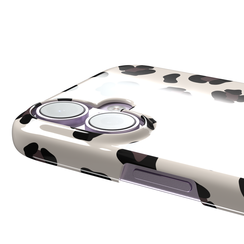 Leopard print phone case in black and dark brown spots on warm cream background, color variant, phone case by Caselier — snap case, volume buttons detail
