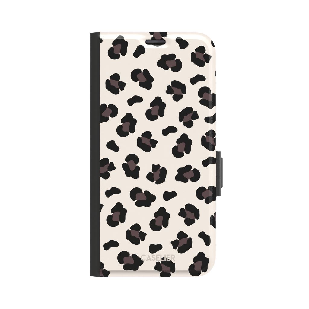 Leopard print phone case in black and dark brown spots on warm cream background, color variant, phone case by Caselier — wallet case, front view