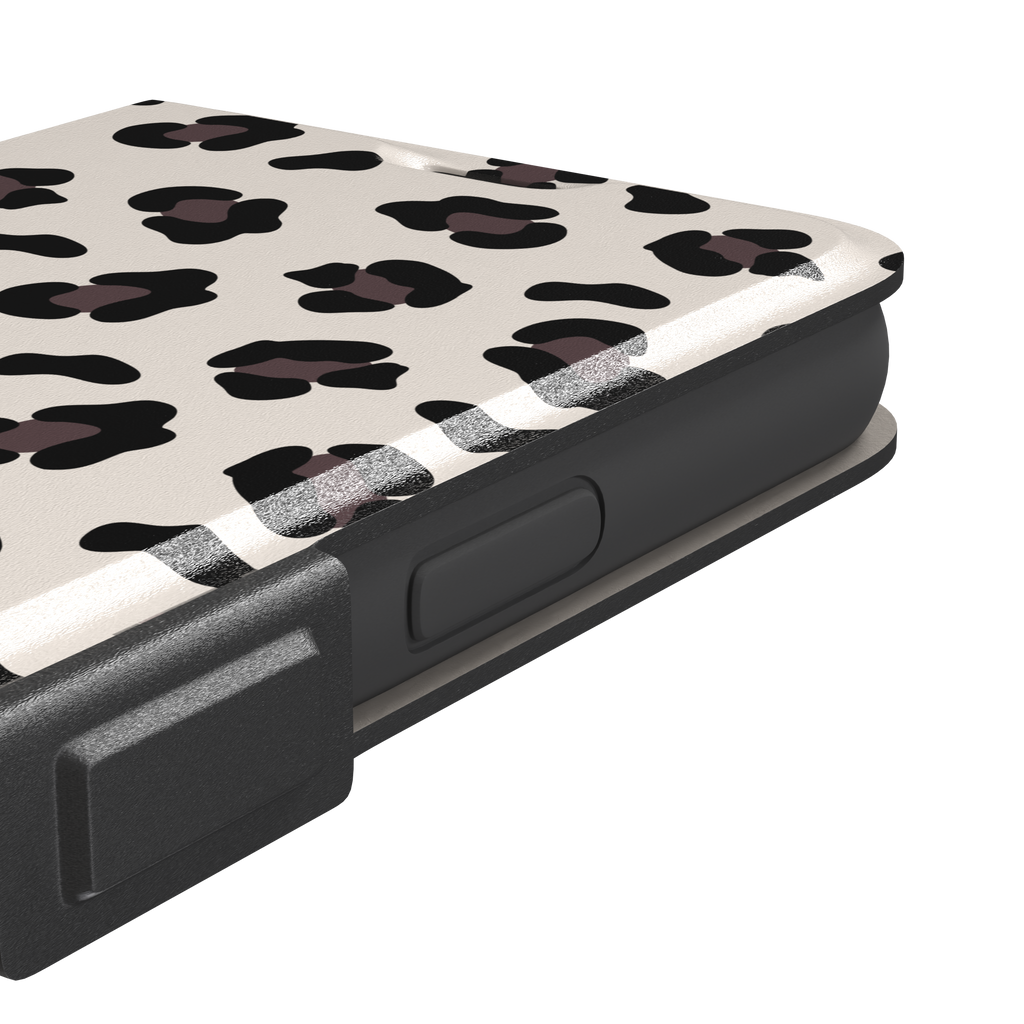 Leopard print phone case in black and dark brown spots on warm cream background, color variant, phone case by Caselier — wallet case, volume buttons detail