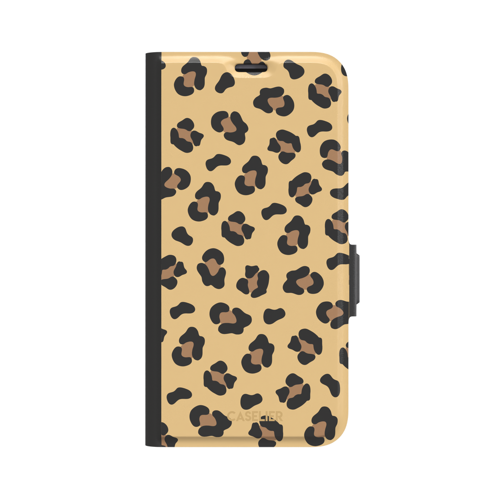 Leopard print phone case in black and brown spots on sandy golden-yellow background, color variant, phone case by Caselier — wallet case, front view