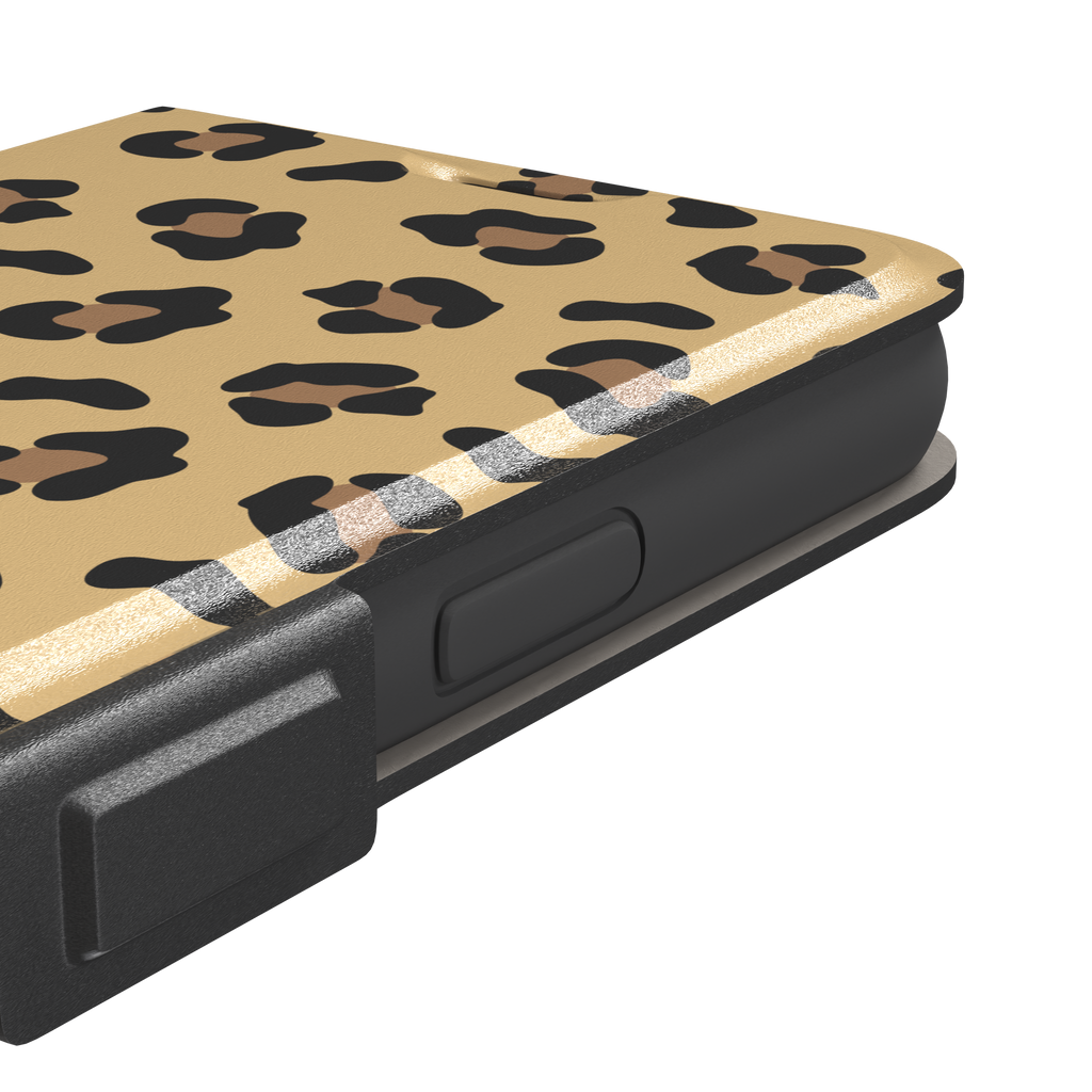 Leopard print phone case in black and brown spots on sandy golden-yellow background, color variant, phone case by Caselier — wallet case, volume buttons detail