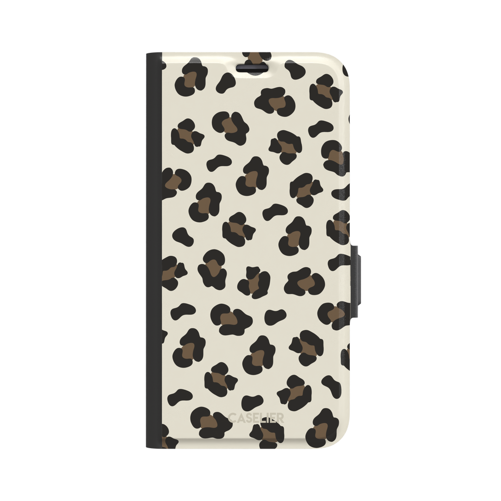Leopard print phone case in black and medium brown spots on light beige background, color variant, phone case by Caselier — wallet case, front view