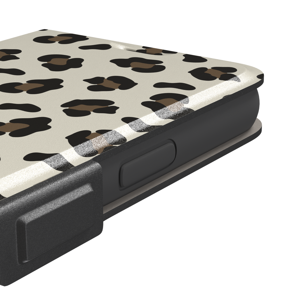 Leopard print phone case in black and medium brown spots on light beige background, color variant, phone case by Caselier — wallet case, volume buttons detail