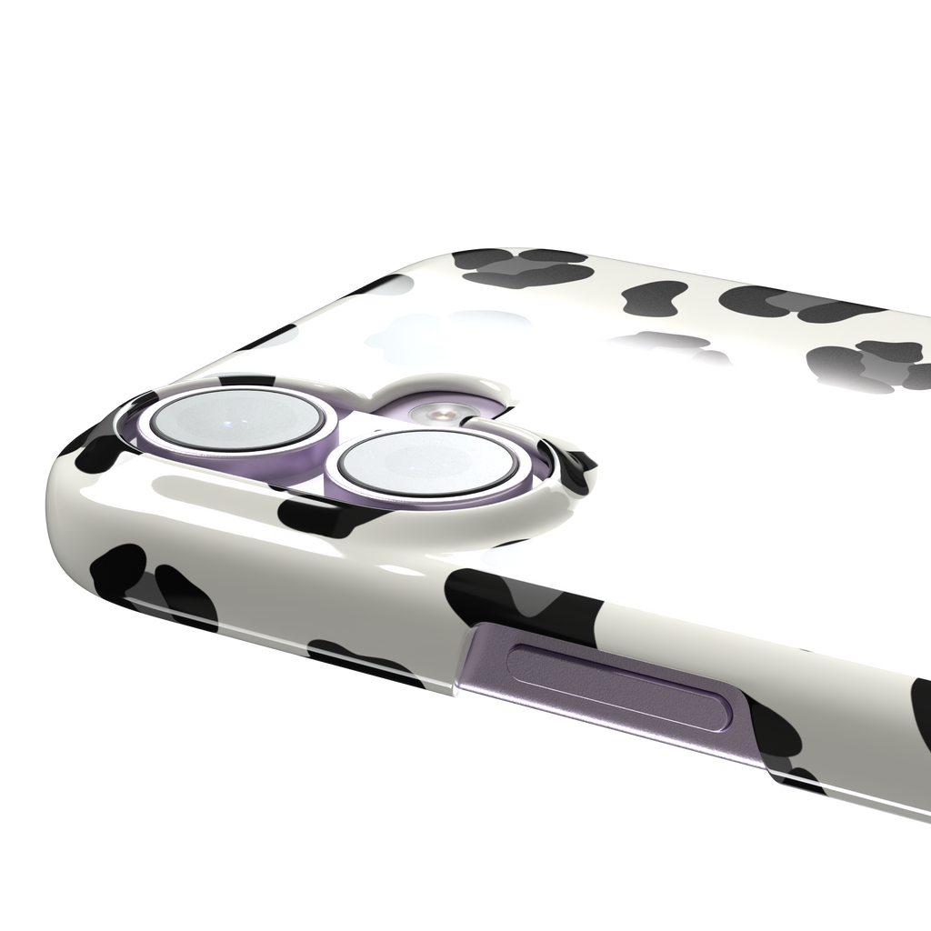 Leopard print phone case in black spots on off-white background, primary product shot, phone case by Caselier — snap case, volume buttons detail