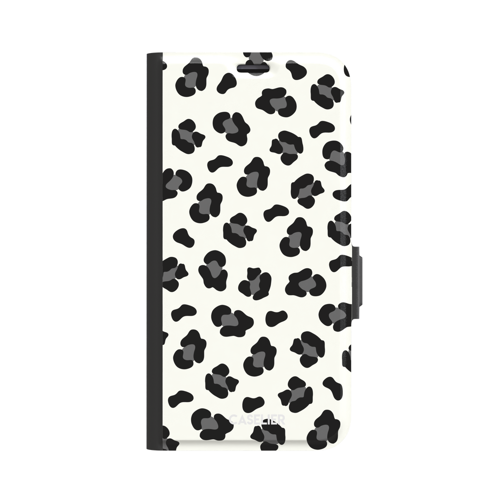 Leopard print phone case in black spots on off-white background, primary product shot, phone case by Caselier — wallet case, front view