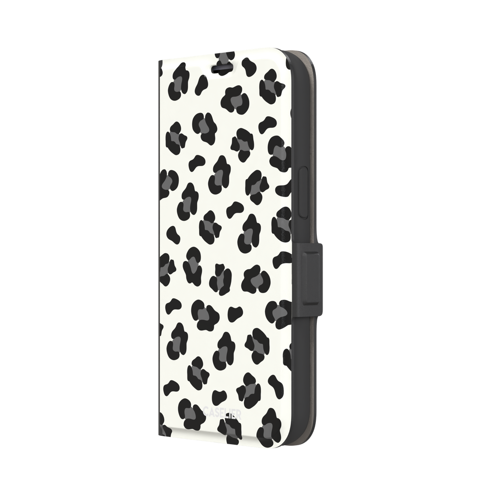 Leopard print phone case in black spots on off-white background, primary product shot, phone case by Caselier — wallet case, right view