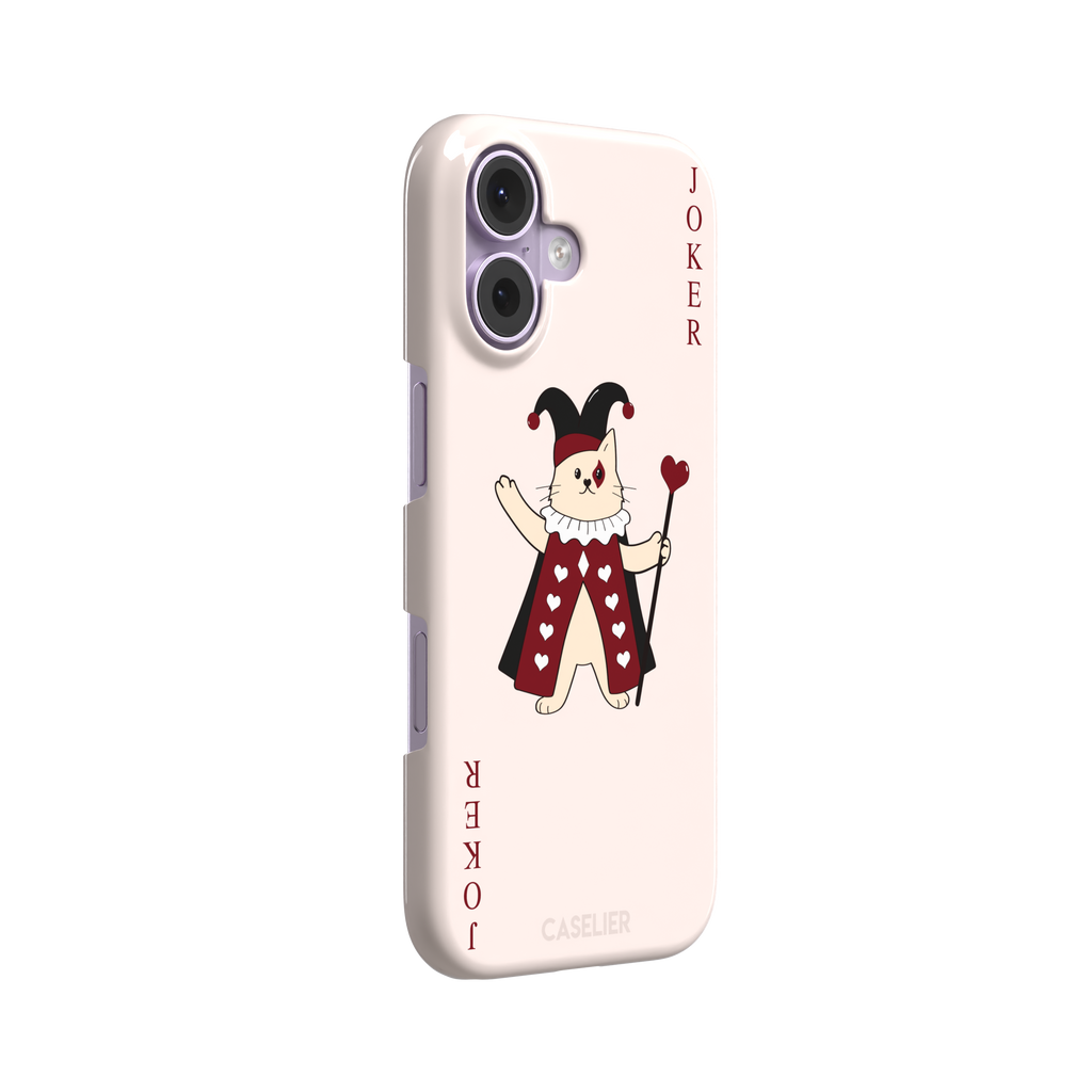 Lord of Jokers phone case in blush pink featuring an illustrated cat dressed as a joker in a crimson heart-patterned robe and black jester hat, holding a heart staff, styled as a playing card with JOKER lettered vertically in dark red, front view, phone case by Caselier — snap case, left view