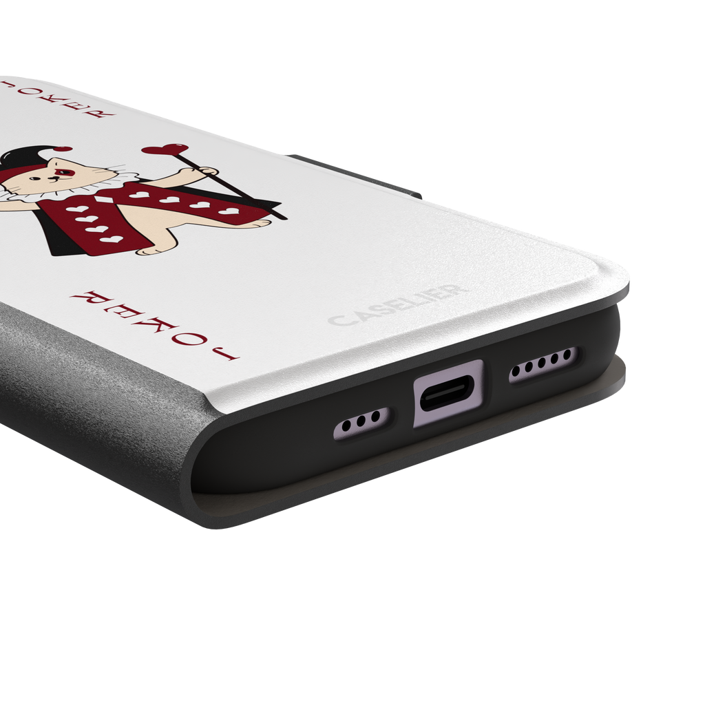 Lord of Jokers phone case in white featuring the same illustrated cat joker in a crimson heart-patterned robe and black jester hat, holding a heart staff, styled as a playing card with JOKER lettered vertically in dark red, white background color variant, phone case by Caselier — wallet case, charging port detail