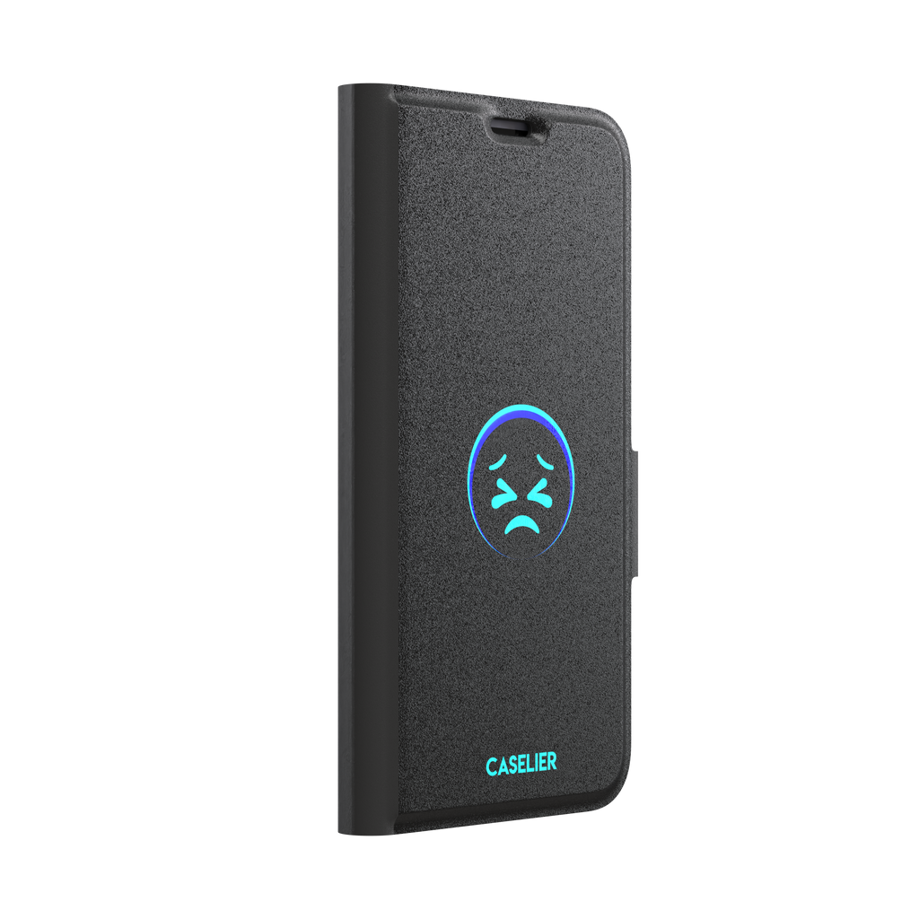 Black phone case with a cyan neon-glow grimacing emoji face centred on the back, phone case by Caselier — wallet case, left view