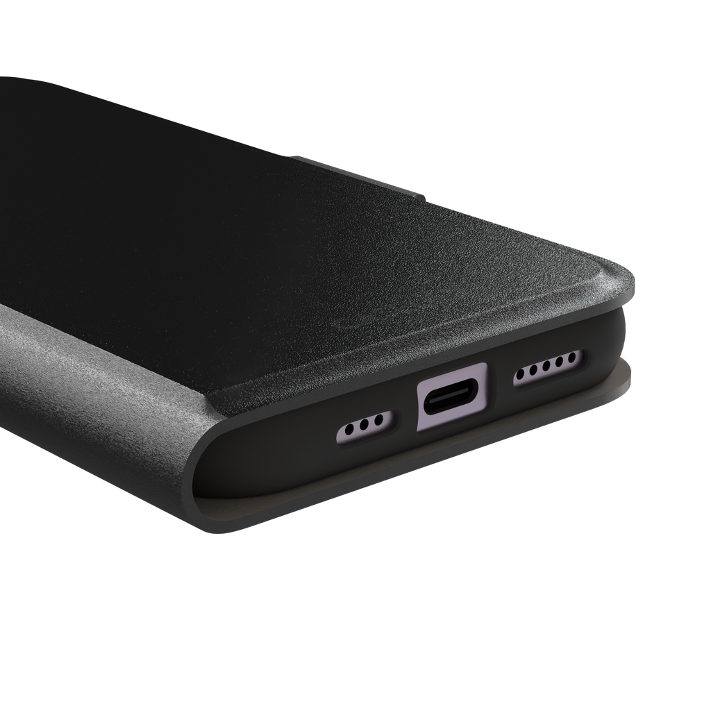 Solid matte black phone case with smooth minimal finish on iPhone, phone case by Caselier — wallet case, charging port detail