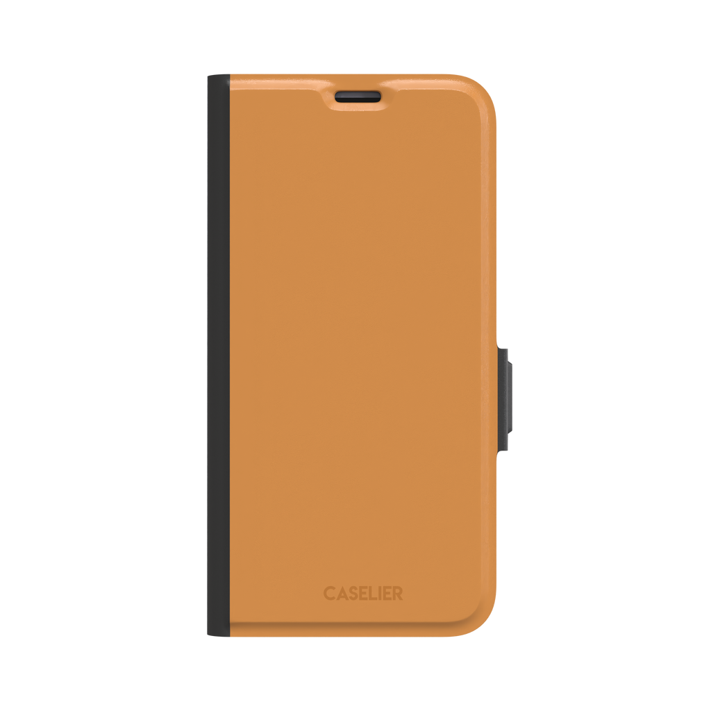 Solid warm amber orange phone case with minimal matte finish on iPhone, phone case by Caselier — wallet case, front view