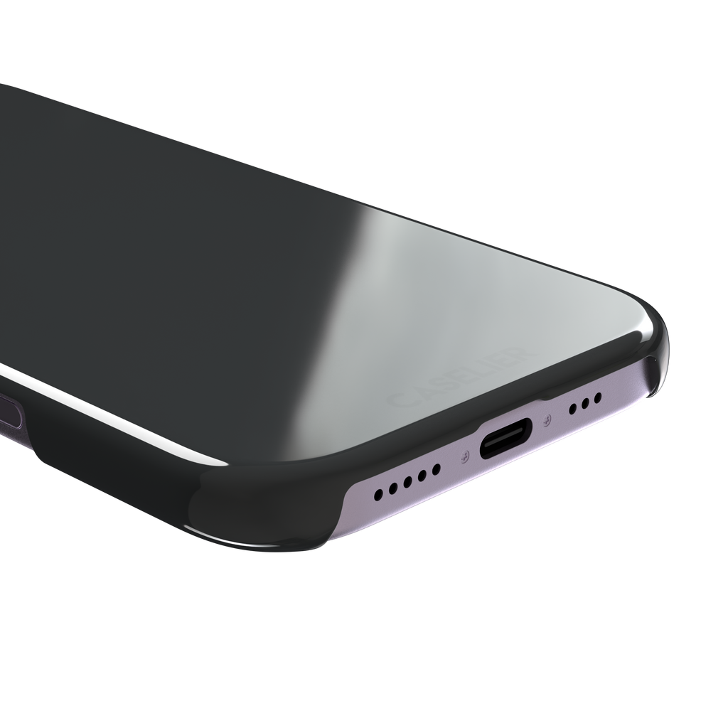 Solid dark charcoal phone case with smooth matte finish on iPhone, phone case by Caselier — snap case, charging port detail