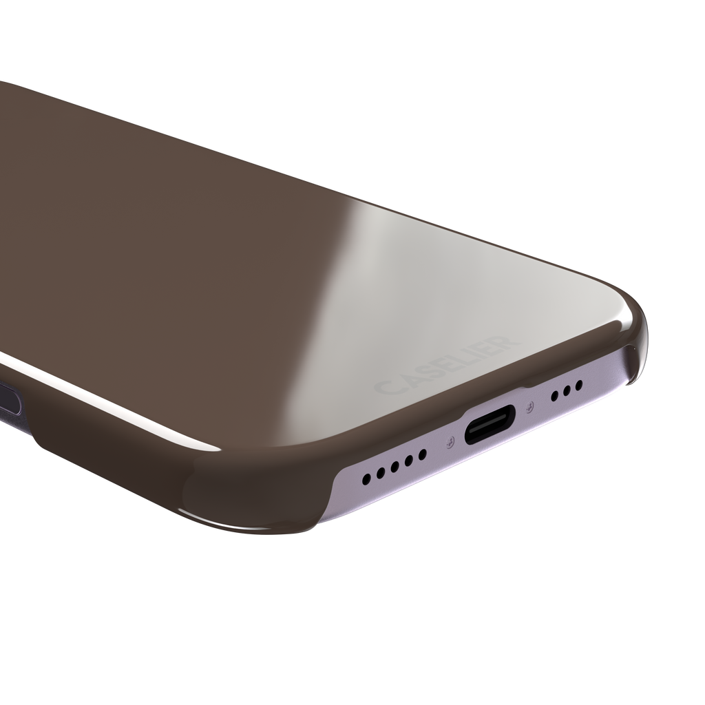 Solid muted taupe-brown phone case with minimal matte finish on iPhone, phone case by Caselier — snap case, charging port detail