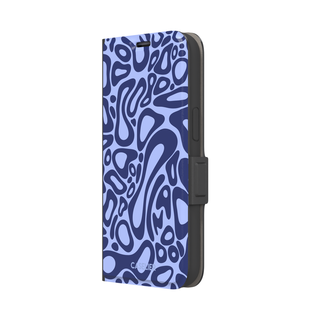 Norris Pattern phone case in periwinkle blue and navy with fluid swirling abstract shapes covering the full back, phone case by Caselier — wallet case, right view