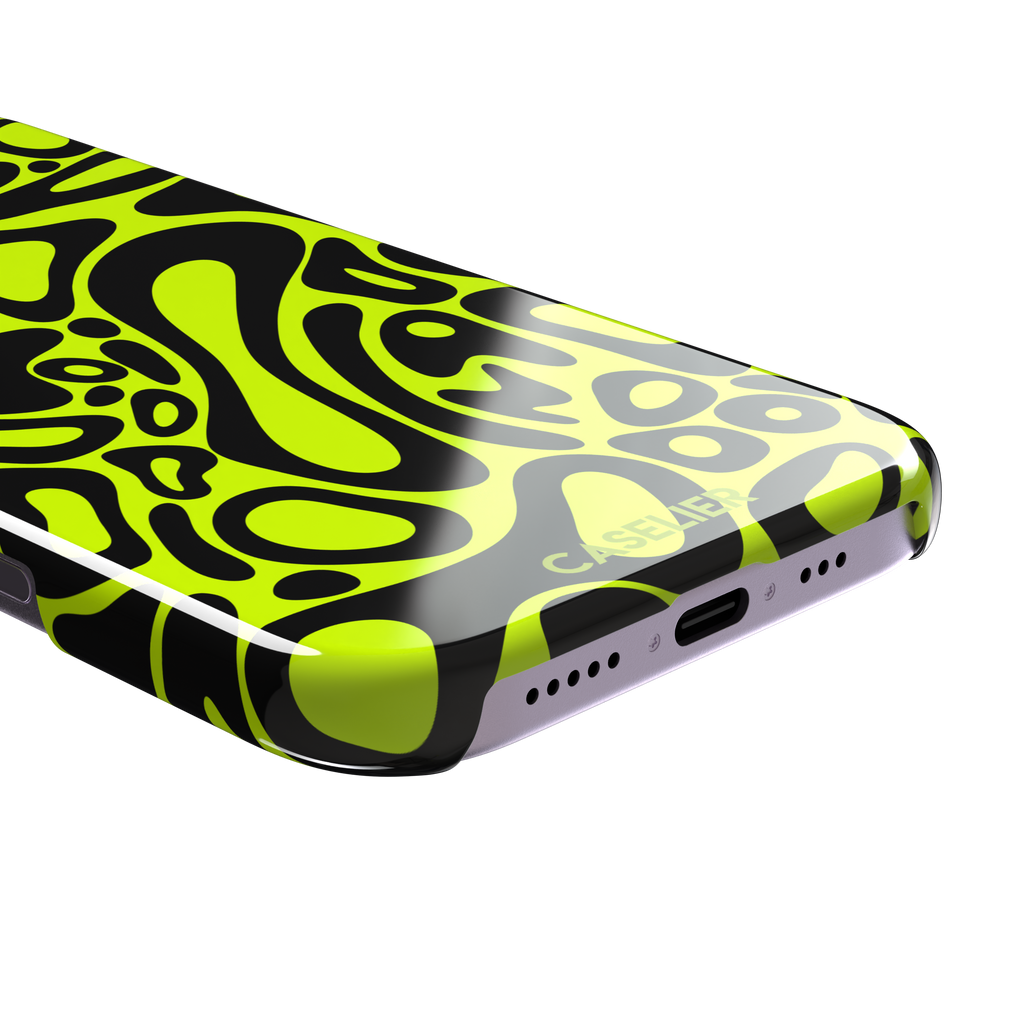 Norris Pattern phone case in neon yellow and black with fluid swirling abstract shapes covering the full back, phone case by Caselier — snap case, charging port detail