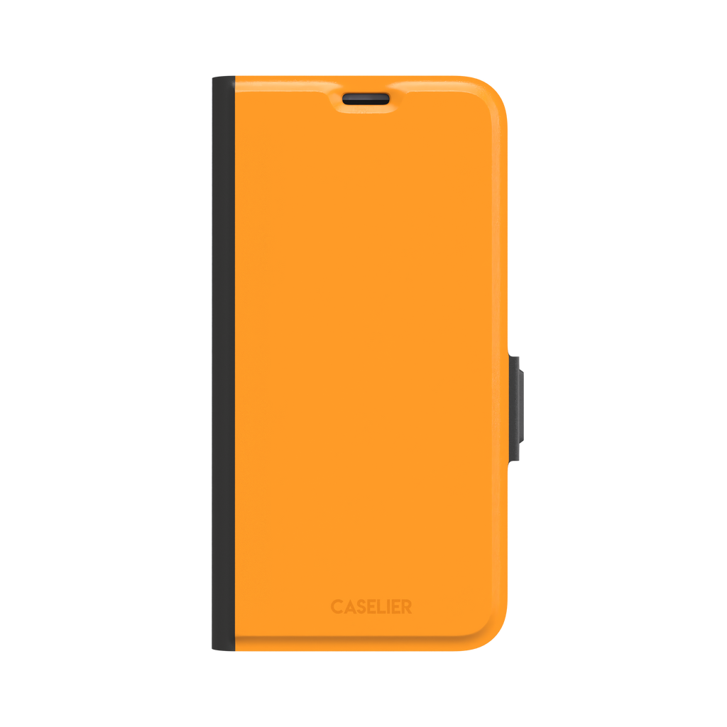 Warm mango-yellow solid-color phone case variant on iPhone, phone case by Caselier — wallet case, front view