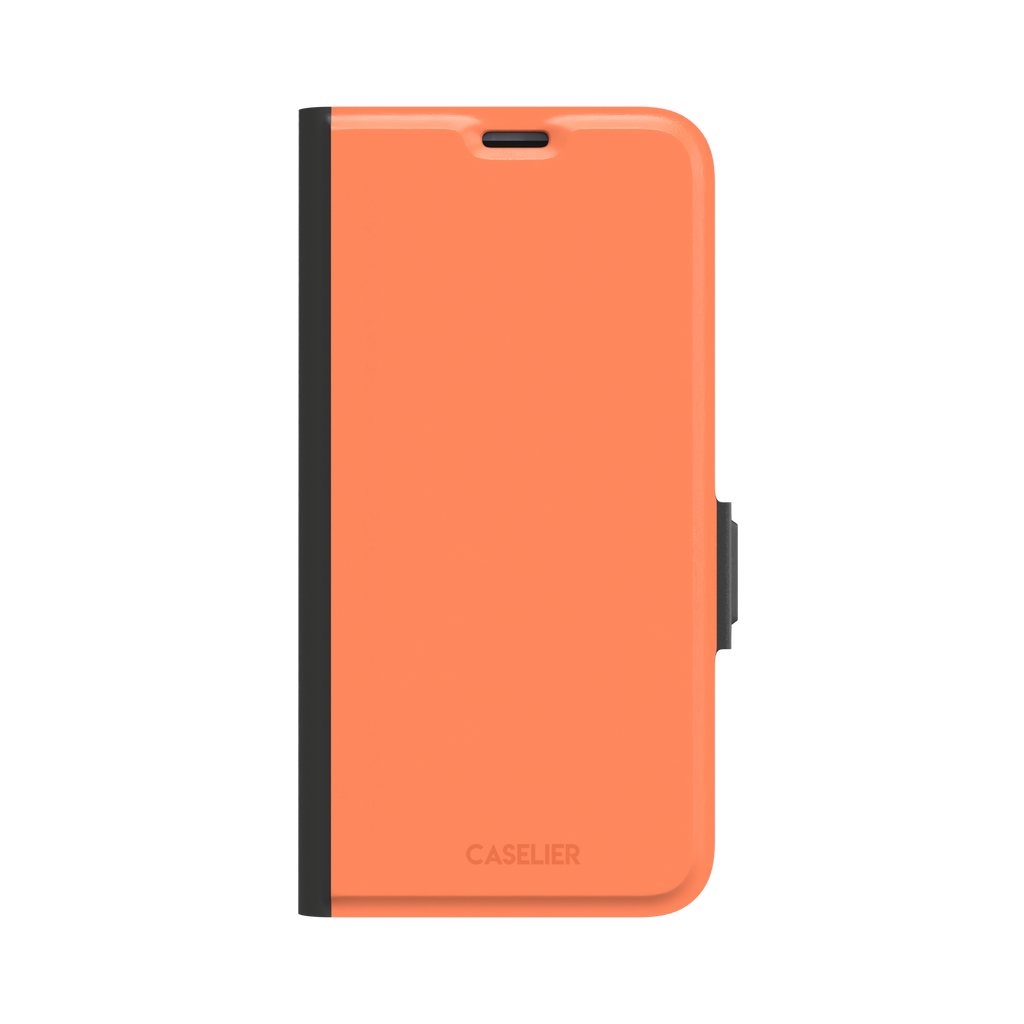 Light coral-orange solid-color phone case variant on iPhone, phone case by Caselier — wallet case, front view