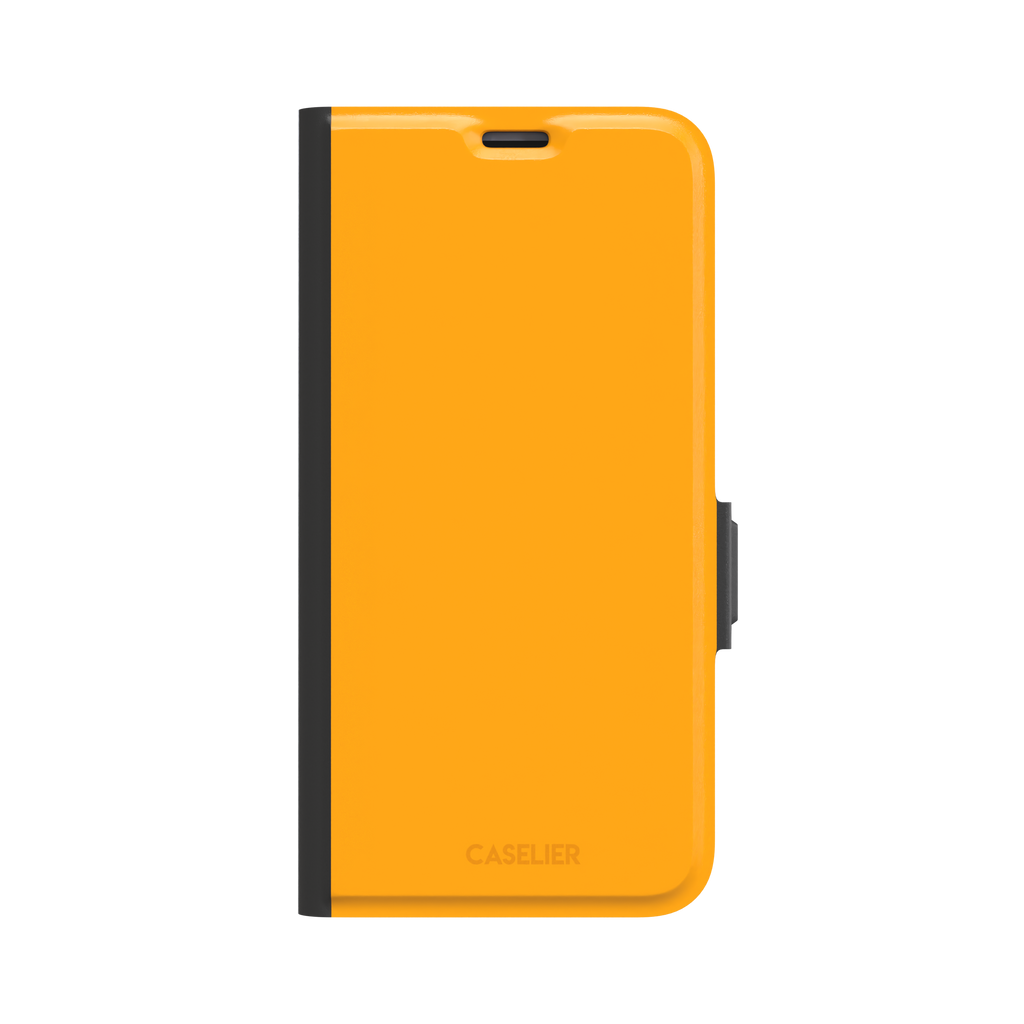 Bright amber-yellow solid-color phone case variant on iPhone, phone case by Caselier — wallet case, front view